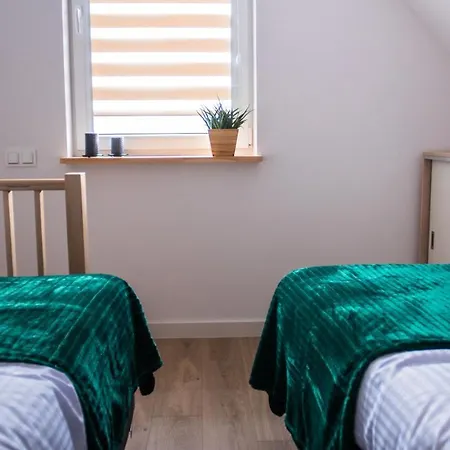 Апартаменты Ptasia Osada Joachimowka Gadkowice